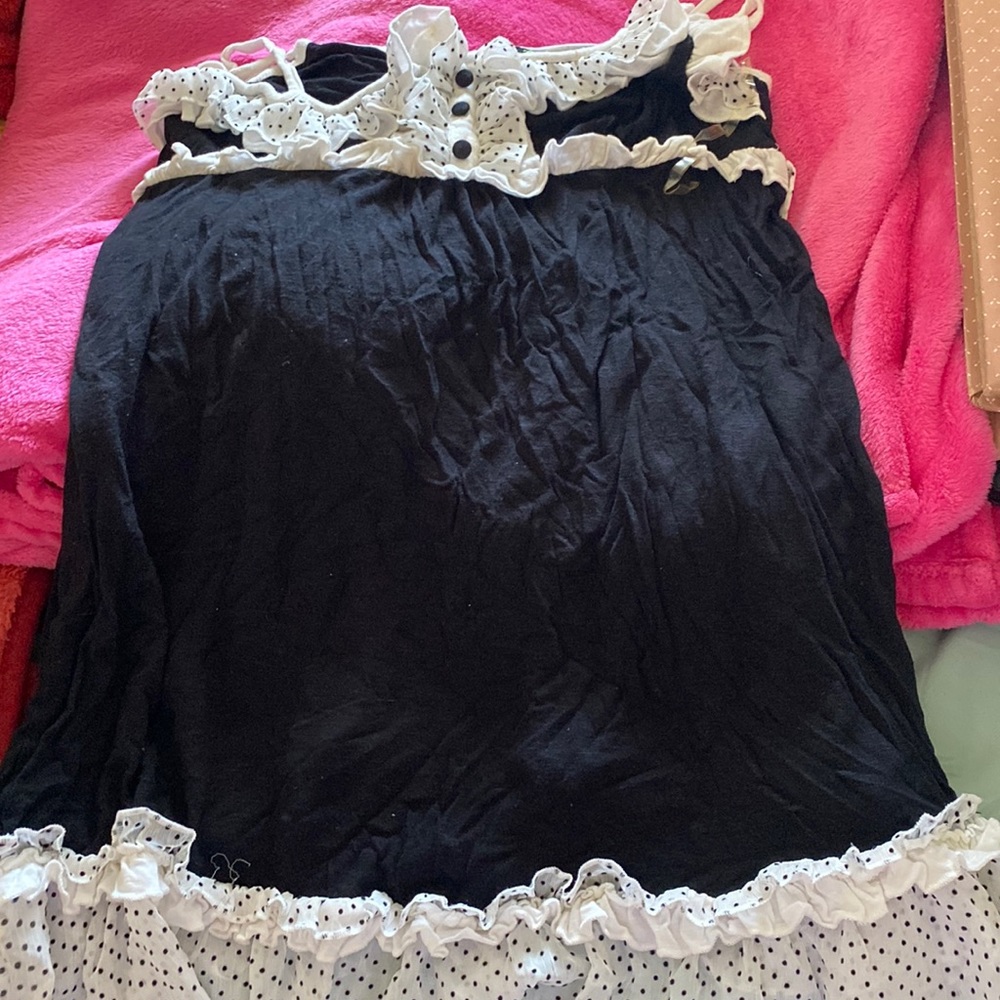 Sidecca cute baby doll top.  Black and white.  With ruffles. Size Large.